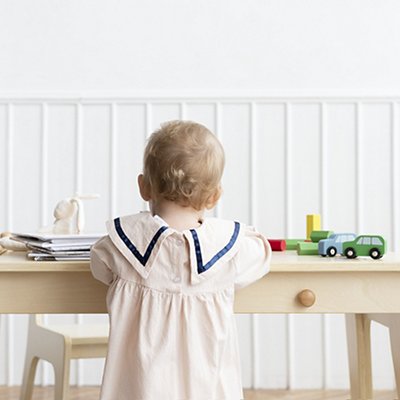 Toddler playing in her play room