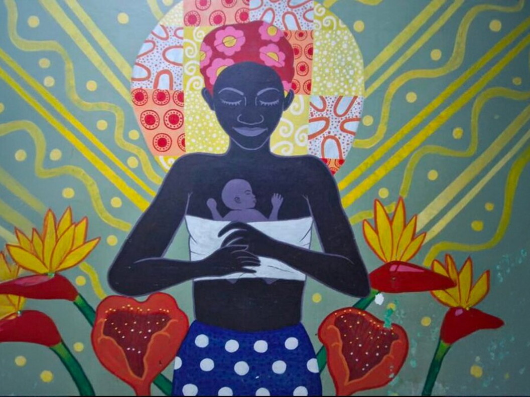 A brightly coloured painting depicts a woman holding a baby in her arms